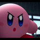 A close-up of Kirby, looking determined and seeming to be striding toward the camera.